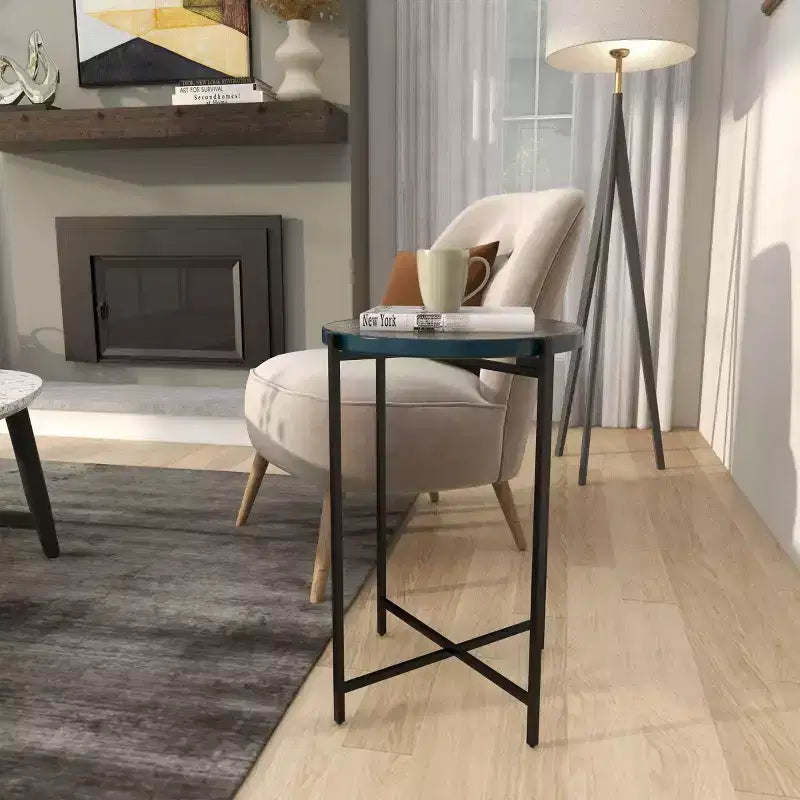 Guéridon en métal en forme de X avec plateau en verre texturé noir