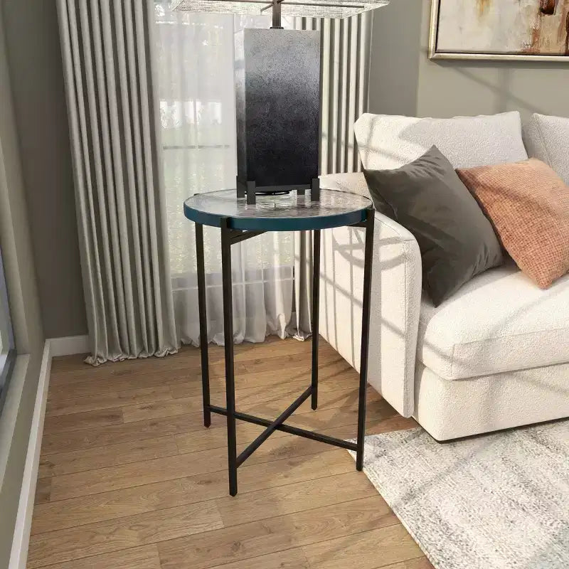 Guéridon en métal en forme de X avec plateau en verre texturé noir